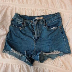 Blue denim size 29 high rise distressed Levi jean shorts